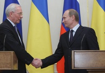 N.J. Azarow i W.W. Putin, 2010.
http://ria.ru/politics/20100410/220276461.html