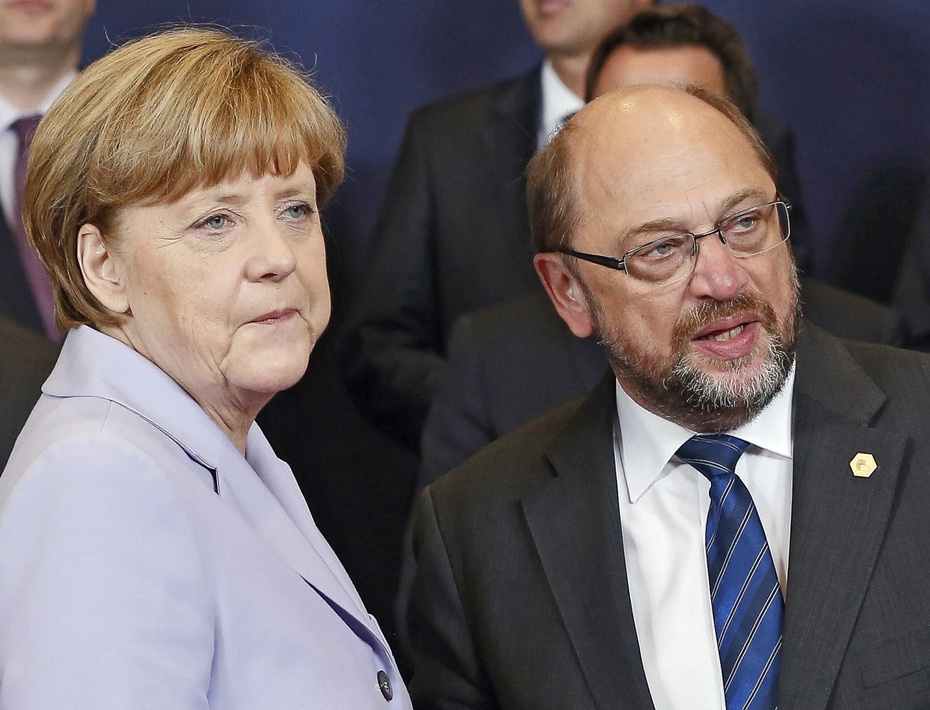 Angela Merkel i Martin Schulz zawalczą o fotel kanclerza Niemiec, fot. PAP/EPA/JULIEN WARNAND