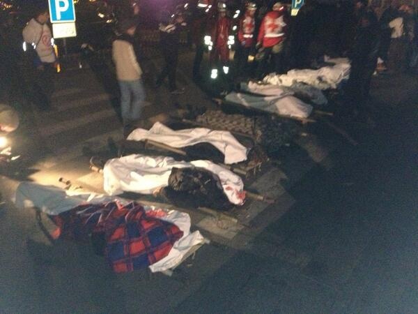 Duncan Crawford ‏@_DuncanC

A line of dead bodies outside the #Ukraine Hotel in #Kiev tonight. Many died from bullet wounds.