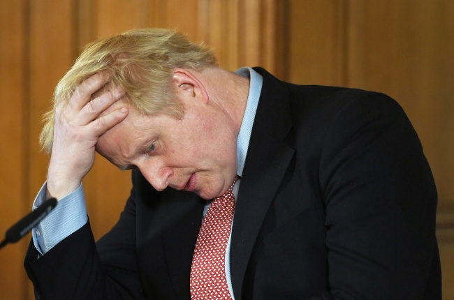 Brytyjski premier Boris Johnson ma lekkie objawy koronawirusa. Fot. PAP/EPA/FACUNDO ARRIZABALAGA/POOL