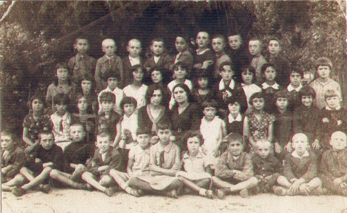 Jewish children with their schoolteachers, Jedwabne, 1933, including three boys who survived the war by hiding on Antonina Wyrzykowska's farm. Back row, second left: Szmul Wasersztajn (who gave a statement in 1945); third, Mosze Olszewicz; and fourth, Jan