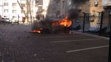 Spalony samochód przed ofisem partii Regionów w Kijowie