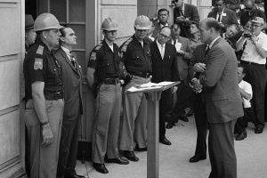 Former Alabama Gov. George C. Wallace vowed "segregation forever" and blocked the door to keep blacks from enrolling at the University of Alabama on June 11, 1963, in Tuscaloosa, Ala, while being confronted by Deputy U.S. Attorney General Nicholas Katzenb