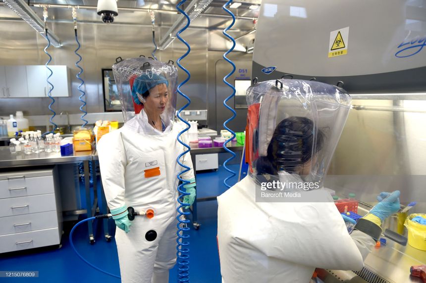 WUHAN, CHINA - FEBRUARY 23 2017: Virologist Shi Zheng-li, left, works with her colleague in the P4 lab of Wuhan Institute of Virology (WIV) in Wuhan in central China's Hubei province Thursday, Feb. 23, 2017.- PHOTOGRAPH BY Feature China / Barcroft Studios