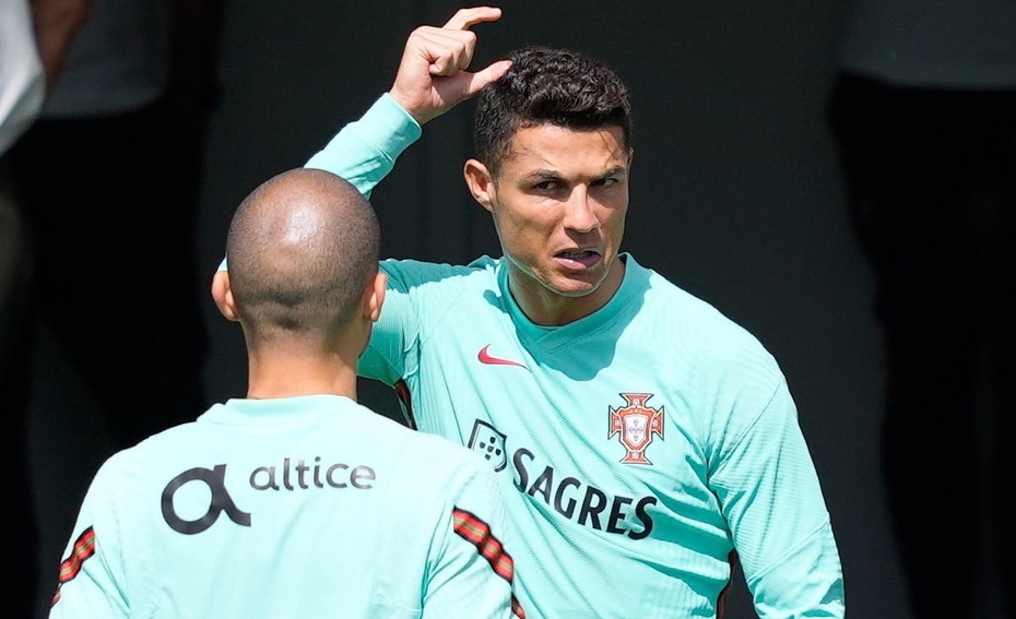 Euro 2020. Ronaldo zaskoczył na konferencji prasowej. Poszło o Coca-Colę. PAP/EPA/Hugo Delgado