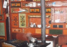 wnętrze kuchni z domowym ogniskiem, na którym gotuje się posiłki