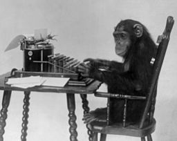 szympans przy maszynie do pisania. New York Zoological Society