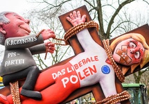 A float in the Dusseldorf Rose Monday Carnival parade features an effigy of Jaroslaw Kaczynski, leader of the Law and Justice (PiS) ruling political party in Poland, with the words “The liberal Poland' in Dusseldorf on March 4. The parade is known for its