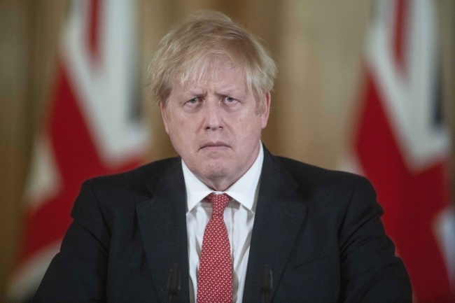 Premier Wielkiej Brytanii Boris Johnson ma koronawirusa, fot. PAP/EPA/JULIAN SIMMONDS