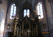 Ołtarz główny i obraz M. Boskiej uratowany w 1940 z kościoła pojezuickiego   foto graf13