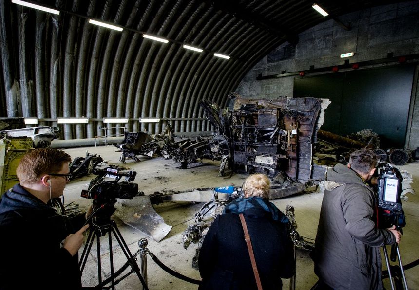 Fig. 10 The remains of the boeing keel  in the corner of the hangar in the Netherlands. Away from the cameras of reporters.